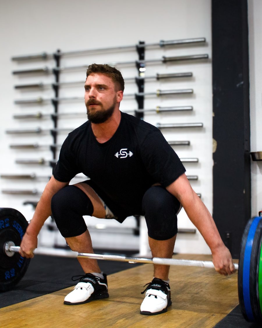 Simon set over the barbell, ready to lift